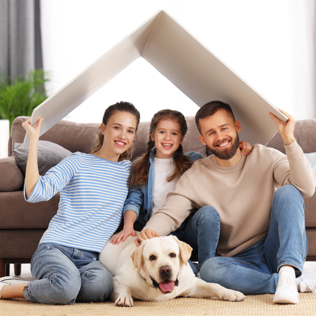 Family with yellow lab